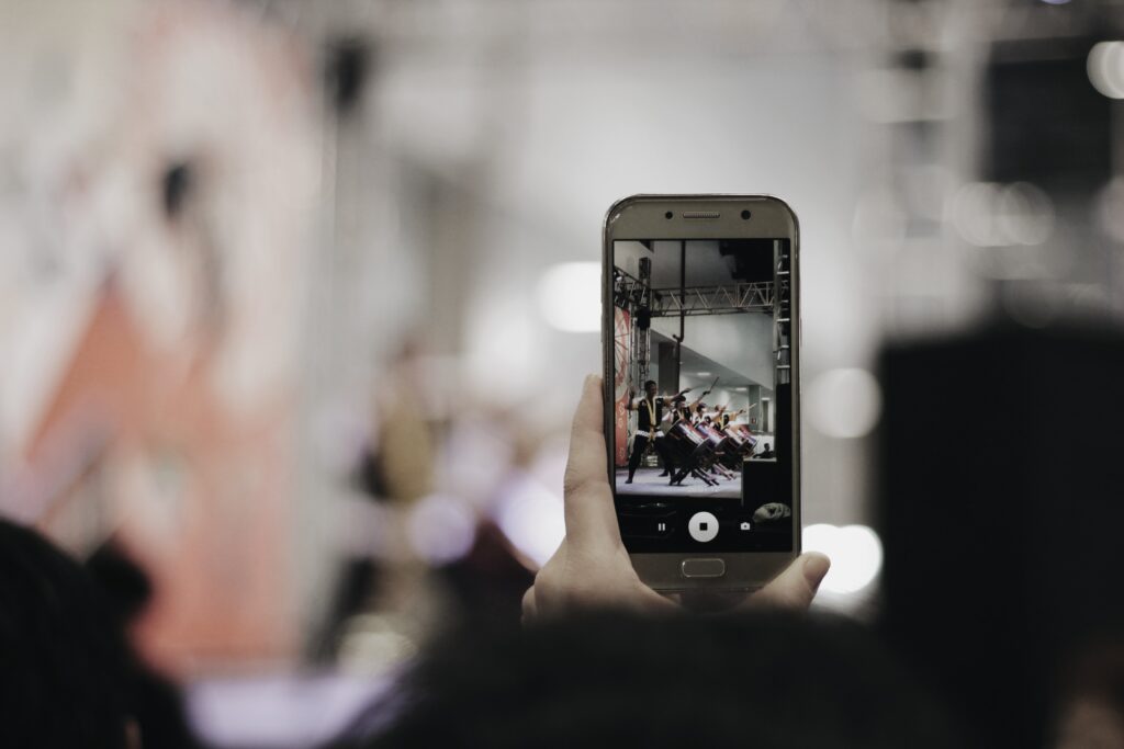 A person filming a TikTok video.