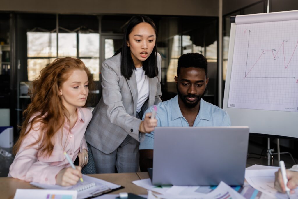 Group reviewing statistics from a recent Google Ad campaign