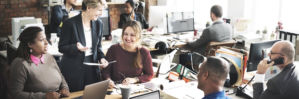 Office setting with a group of employees