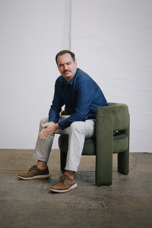 Garrett on a chair